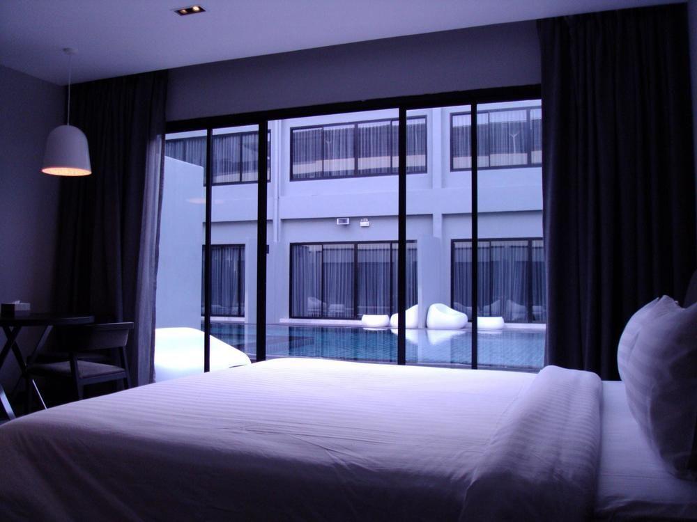 S Ratchada Leisure Hotel - Sha Plus Bangkok Exteriér fotografie A bedroom at the hotel